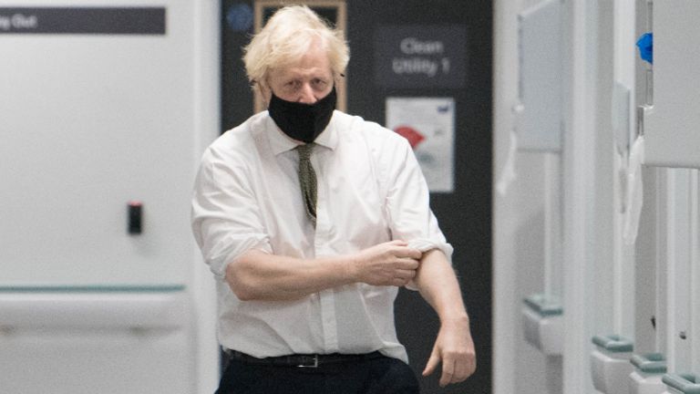 Prime Minister Boris Johnson during a visit to view the vaccination programme at Chase Farm Hospital in north London, part of the Royal Free London NHS Foundation Trust. The NHS is ramping up its vaccination programme with 530,000 doses of the newly approved Oxford/AstraZeneca Covid-19 vaccine jab available for rollout across the UK.