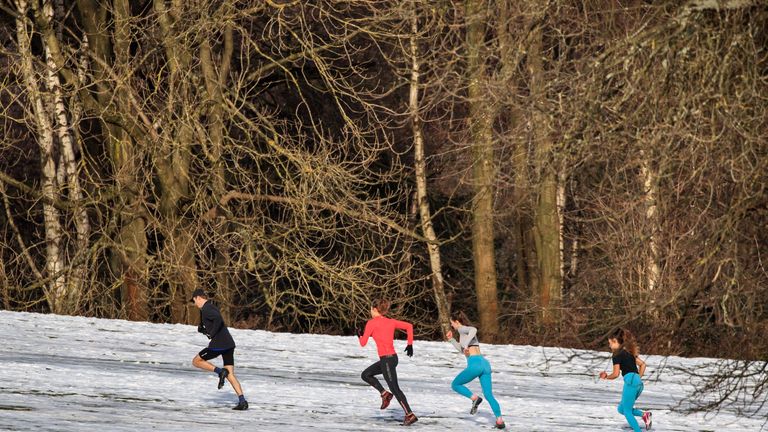 RETRANSMITTING AMENDING THE PICTURE DATE. People exercise in Roundhay Park, Leeds, Yorkshire.