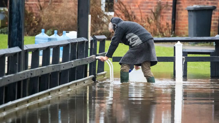 A man in flood water near Naburn Lock Caravan Park in York as Storm Christoph is set to bring widespread flooding, gales and snow to parts of the UK. Heavy rain is expected to hit the UK overnight on Tuesday, with the Met Office warning homes and businesses are likely to be flooded, causing damage to some buildings. Picture date: Tuesday January 19, 2021.in York as Storm Christoph is set to bring widespread flooding, gales and snow to parts of the UK. Heavy rain is expected to hit the UK overnight on Tuesday, with the Met Office warning homes and businesses are likely to be flooded, causing damage to some buildings. Picture date: Tuesday January 19, 2021.