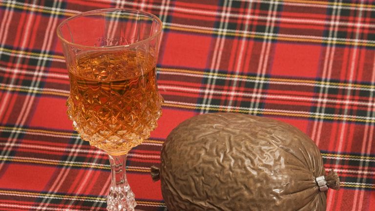 "Scotch whisky in a crystal thistle glass with a haggis on a tartan backdrop.  Traditional Scottish fayre, particularly on Burns Night.Similar images from my portfolio:"