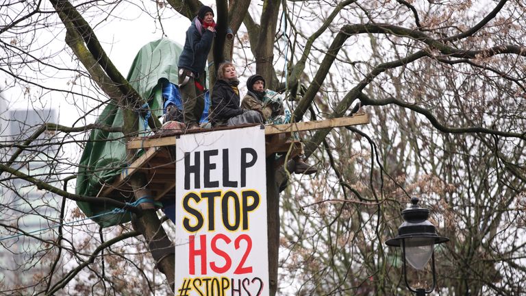 HS2 Rebellion protesters in a tree, part of an encampment in Euston Square Gardens in central London, where the protesters have built a 100ft tunnel network, which they are ready to occupy, after claiming the garden is at risk from the HS2 line development. Picture date: Wednesday January 27, 2021.