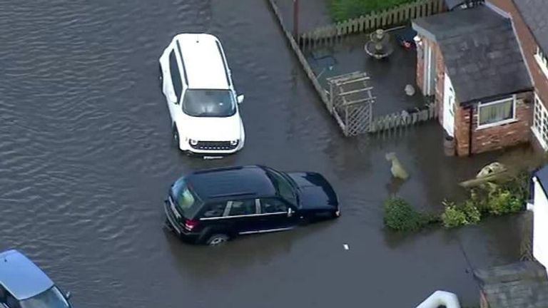 Cars afloat in flooding caused by Storm Christoph