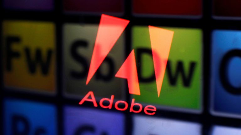 An Adobe logo and Adobe products are seen reflected on a monitor display and an iPad screen, in this picture illustration July 8, 2013. REUTERS/Dado Ruvic/Illustration/File Photo GLOBAL BUSINESS WEEK AHEAD PACKAGE Ð SEARCH ÒBUSINESS WEEK AHEAD SEPTEMBER 19Ó FOR ALL IMAGES