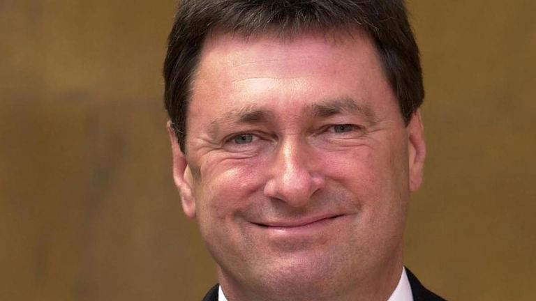 Britain&#39;s favourite gardener Alan Titchmarsh poses for photographers after receiving an MBE for services to horticulture and broadcasting from Britain&#39;s Queen Elizabeth II at Buckingham Palace in London June 6 2000. 