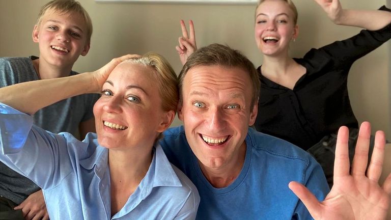 Alexei Navalny and his wife Yulia pose for a selfie with their children in a video released on 31 December on his Instagram account