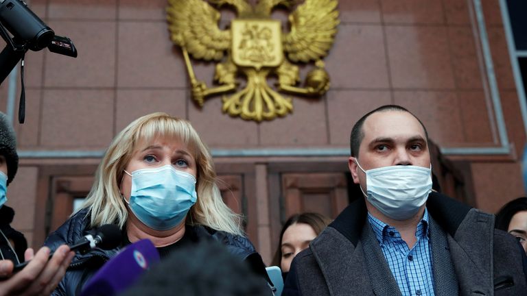 Mr Navalny&#39;s lawyers Olga Mikhailova and Vadim Kobzev outside the court