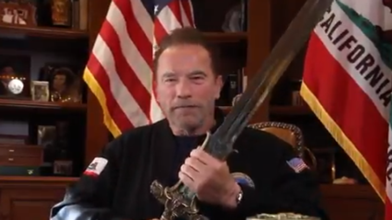 Arnie wields his old Conan sword during the video. Pic: Twitter