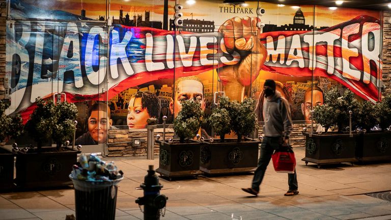 A Black Lives Matter painting near the White House in Washington. Mr Biden&#39;s administration will tackle racial inequality
