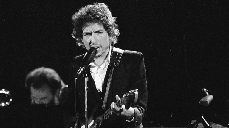 Bob Dylan performs with The Band at the Forum in Los Angeles in 1974