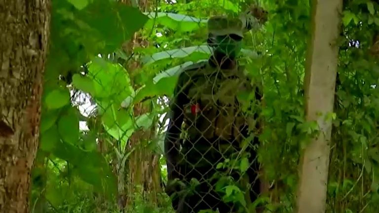 A member of Uganda&#39;s military sees outside Bobi Wine&#39;s property