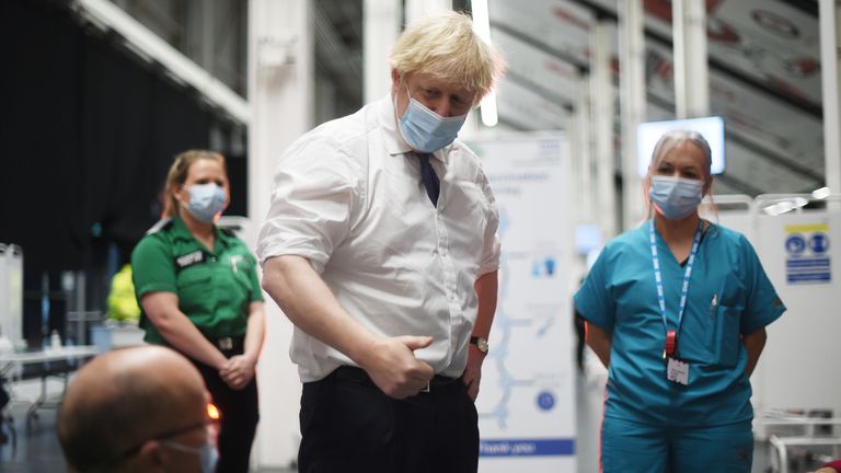 Britain&#39;s Prime Minister Boris Johnson visits a COVID-19 vaccination centre at Ashton Stadium in Bristol