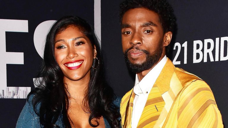 Chadwick Boseman and Taylor Simone Ledward at a screening of "21 Bridges" in New York City in 2019