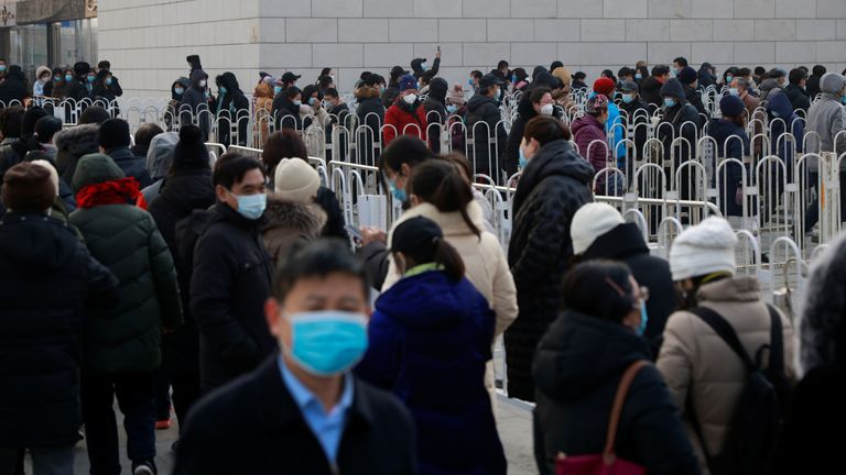 People queue to get tested after the latest COVID-19 outbreak in Beijing, China