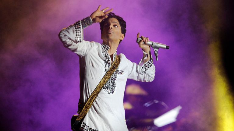 Prince performs during his headlining set on the second day of the Coachella Valley Music and Arts Festival in Indio, Calif., Saturday, April 26, 2008. (AP Photo/Chris Pizzello)