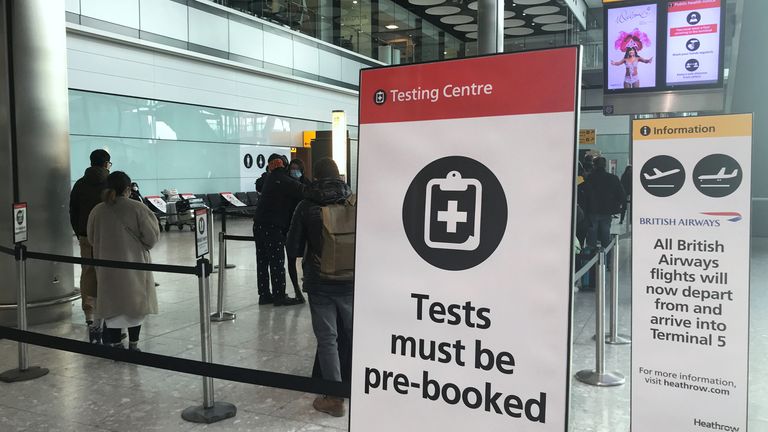 Passengers from international flights arrive at Heathrow Airport