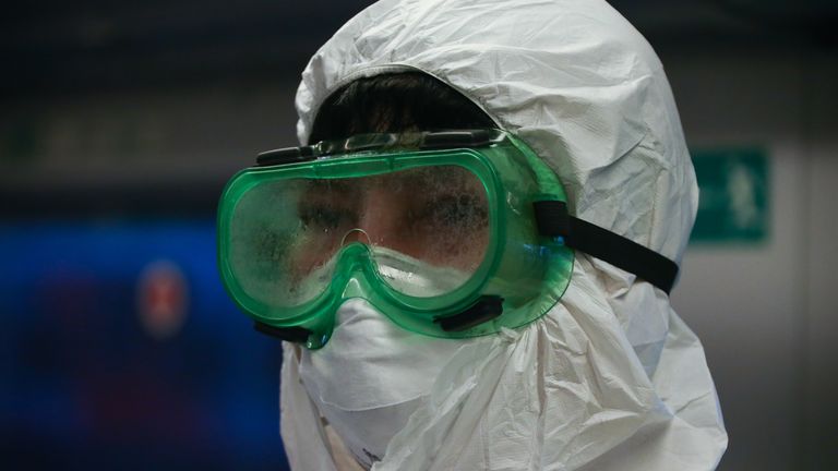 SOCHI, RUSSIA - NOVEMBER 2, 2020: A worker wears personal protective equipment while disinfecting a Lastochka suburban train during the outbreak of COVID-19. Dmitry Feoktistov/TASS