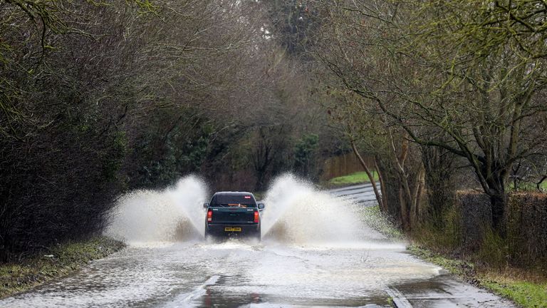 A car drives through floodwater near Dorcester-on-Thames, Oxfordshire. Picture date: Saturday January 30, 2021