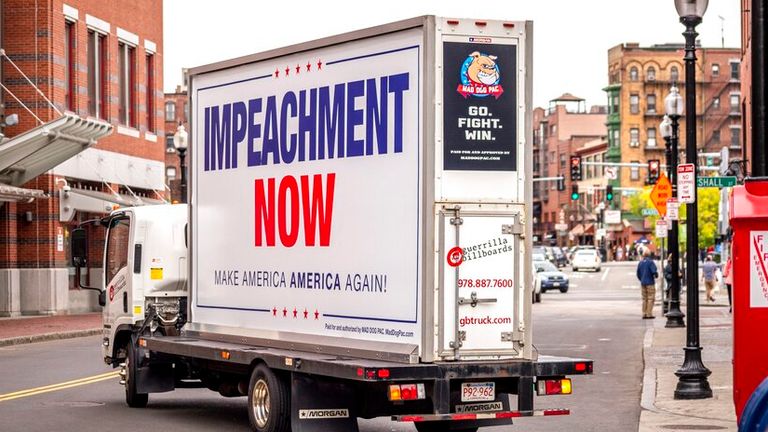 Donald Trump&#39;s opponents in Boston are promoting impeachment against the US president. They have mounted the large-scale demand "Impeachment now" on a truck with which they roll through the streets. They demand: "Make America America again". (08 Oct 2019) | usage worldwide Photo by: Jürgen Schwenkenbecher/picture-alliance/dpa/AP Images