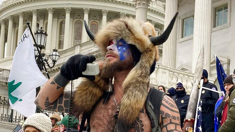 Photo by: zz/STRF/STAR MAX/IPx 2021 1/7/21 Jake Angeli, a QAnon &#39;Shaman&#39;, was seen storming the Capitol Building yesterday in Washington, D.C.. STAR MAX File Photo: 1/6/21 The United States Capitol Building in Washington, D.C. was breached by thousands of protesters during a "Stop The Steal" rally in support of President Donald Trump during the worldwide coronavirus pandemic.