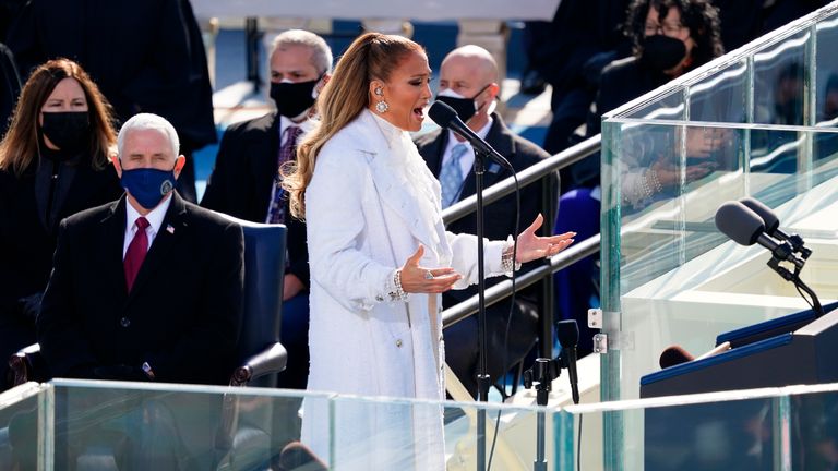 Jennifer Lopez at the inauguration ceremony, as former vice president Mike Pence watches on. Pic: AP
