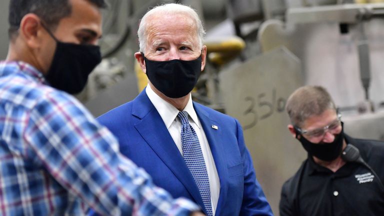 .S. Presidential nominee and former Vice President Joe Biden talks with workers as he tours the Wisconsin Aluminum Foundry before delivering remarks at a campaign event in the factory in Manitowoc, Wisconsin, U.S., September 21, 2020
