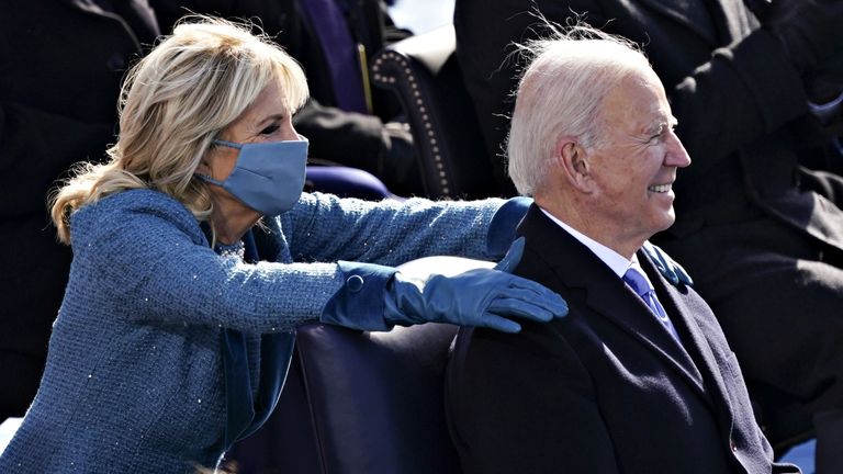 First Lady Jill Biden places her hands on U.S. President Joe Biden during the 59th Presidential Inauguration in Washington, U.S., January 20, 2021. Kevin Dietsch/Pool via REUTERS
