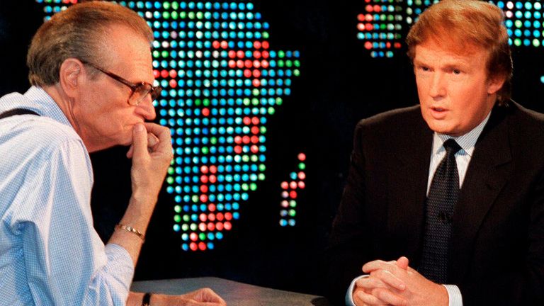 Donald Trump, right, is interviewed by Larry King during a taping of "Larry King Live," Thursday, Oct, 7, 1999, in New York. Trump said he has formed an exploratory committee to help him determine whether he can win the White House as a Reform Party candidate. (AP Photo/Marty Lederhandler)