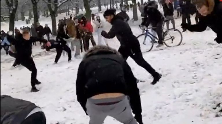 People taking part in a large snowball fight in Hyde Park, Leeds (Pic: @42adam42/TikTok)