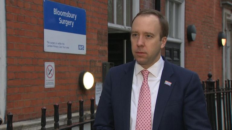 Health Secretary Matt Hancock stands outside Bloomsbury Surgery in London