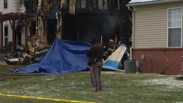 The plane hit a house in Michigan, killing the pilot and two passengers – but a family of five inside the home luckily survived