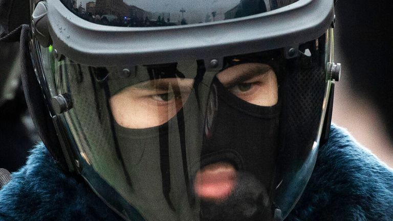 Police officer guards during a protest against the jailing of opposition leader Alexei Navalny in Moscow, Russia, Saturday, Jan. 23, 2021. Russian police on Saturday arrested hundreds of protesters who took to the streets in temperatures as low as minus-50 C (minus-58 F) to demand the release of Alexei Navalny, the country&#39;s top opposition figure. (AP Photo/Pavel Golovkin)