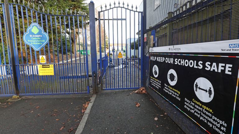 A sign outside St Joseph&#39;s RC Primary School in Highgate, north London, gives advice about necessary precautions to prevent the spread of coronavirus.