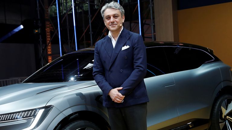 Luca de Meo, Chief Executive Officer of Groupe Renault, poses in front of a Renault Megane eVision car during a news conference about Renault electric strategy during Renault eWays event in Meudon, France, October 15, 2020