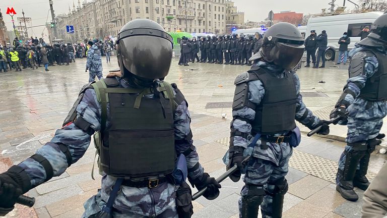 Police link batons in Moscow