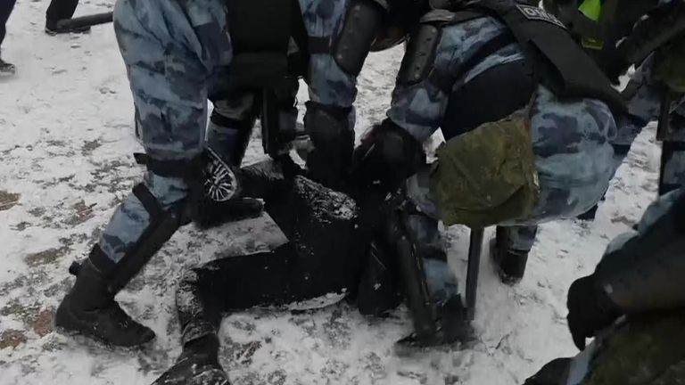 Pro-Navalny protester being arrested by Riussian Police.