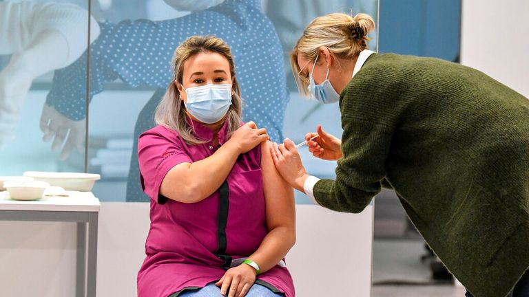 Dutch nurse Sanna Elkadiri becomes the first person in the Netherlands to receive a COVID-19 vaccine  Pic: Pool via AP