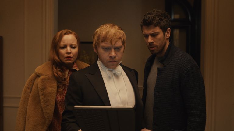 Lauren Ambrose, Rupert Grint, and Toby Kebbell in Servant, premiering January 15 on Apple TV +.