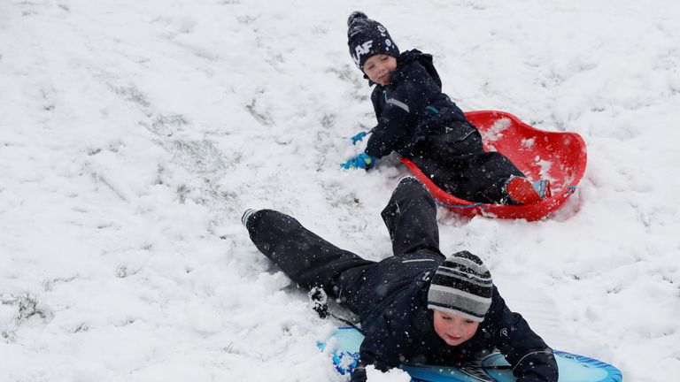 Children play in the snow in Hemel Hempstead