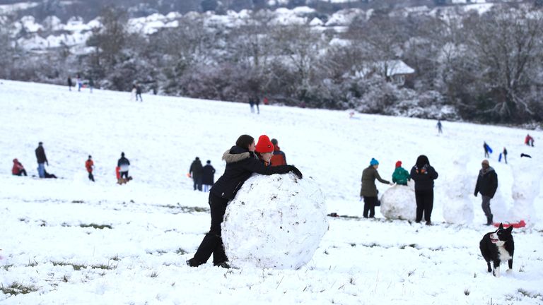 People enjoy the snow in Guildford, Surrey