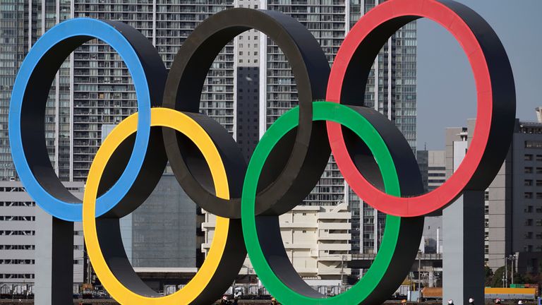The Olympic Symbol is reinstalled after it was taken down for maintenance ahead of the postponed Tokyo 2020 Olympics in the Odaiba section Tuesday, Dec. 1, 2020, in Tokyo. (AP Photo/Eugene Hoshiko)                                                                                      