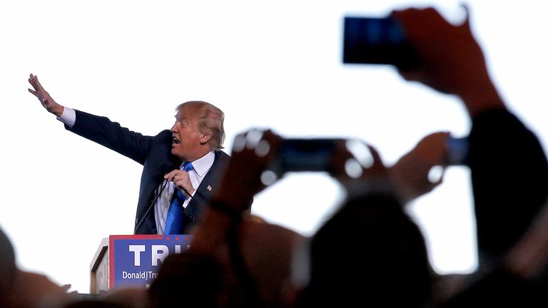 Republican presidential candidate Donald Trump gestures as he speaks at a campaign rally, Wednesday, Dec. 16, 2015, in Mesa, Ariz. (AP Photo/Ross D. Franklin)