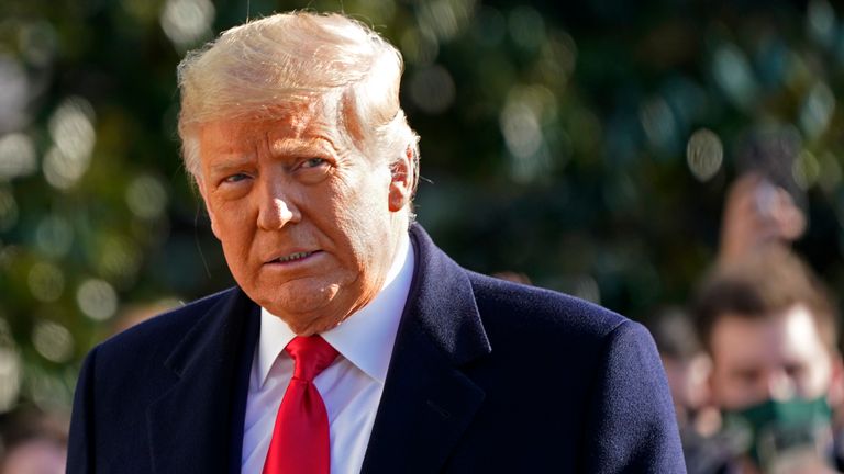 President Donald Trump walks to board Marine One on the South Lawn of the White House, Tuesday, Jan. 12, 2021, in Washington.  The President is traveling to Texas. (AP Photo/Gerald Herbert )