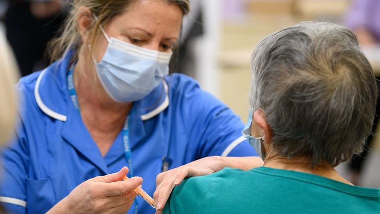 A COVID-19 vaccine is given at Robertson House in Stevenage