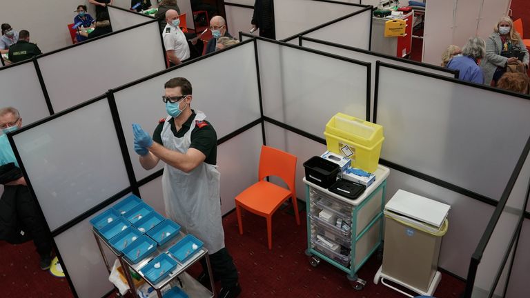 A healthcare workers fills a syringe with a Covid-19 vaccine at the NHS vaccine centre that has been set up at the Centre for Life in Times Square, Newcastle. The centre is one of the seven mass vaccination centres now opened to the general public as the government continues to ramp up the vaccination programme against Covid-19.