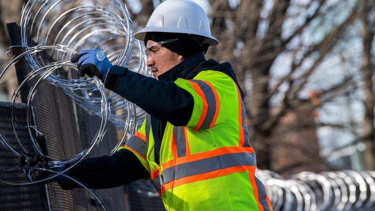 Barbed wire is placed at Columbus Circle, near the Capitol in Washington. Pic: AP