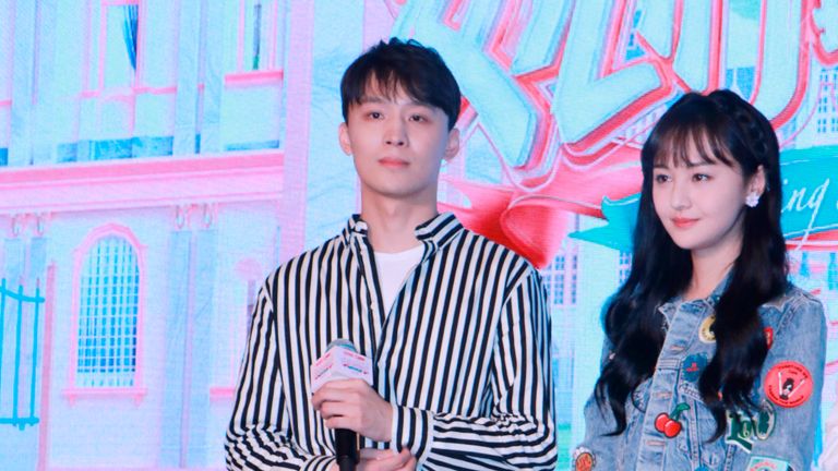Chinese actress Zheng Shuang, right, and her boyfriend Zhang Heng attend a press conference for reality show "Meeting Mr. Right" Season 2 in Shanghai, China, 22 August 2019. (Imaginechina via AP Images)