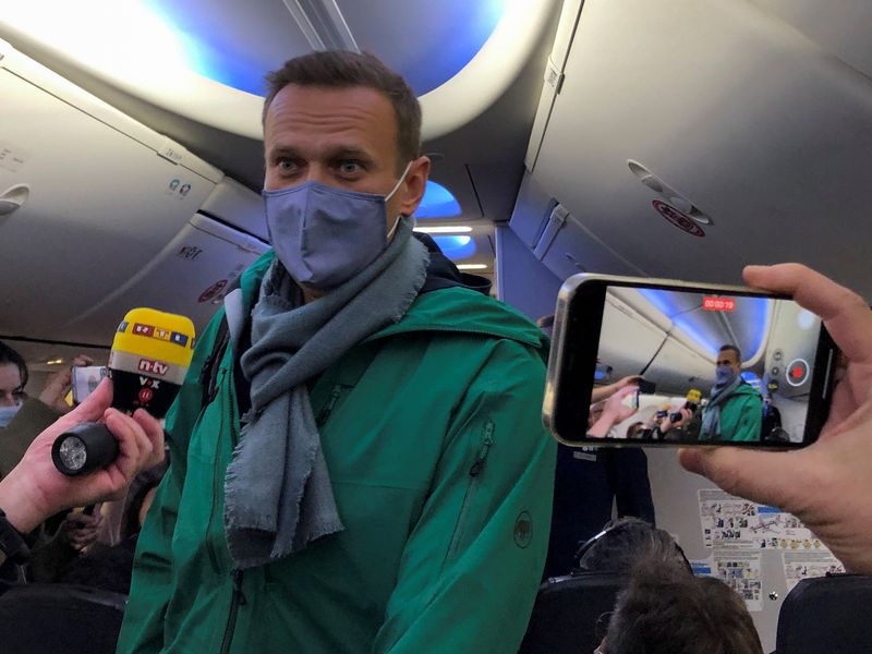 Alexei Navalny Poisoned Putin Critic Detained After Arriving In Moscow World News Sky News