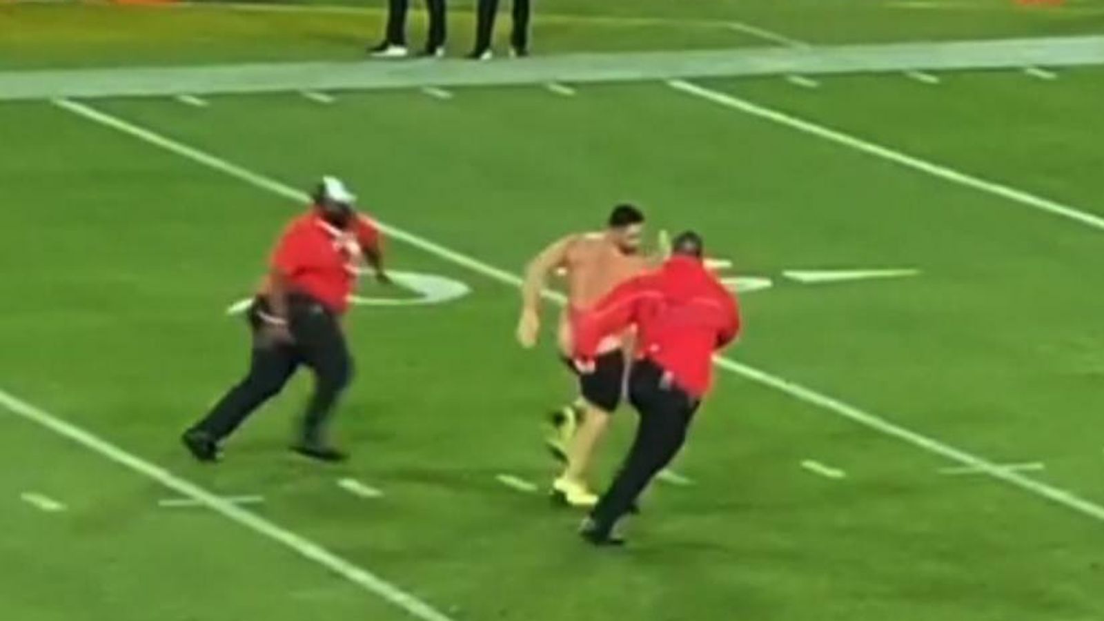 Super Bowl: Man in swimsuit invades field mid-game | World News | Sky News