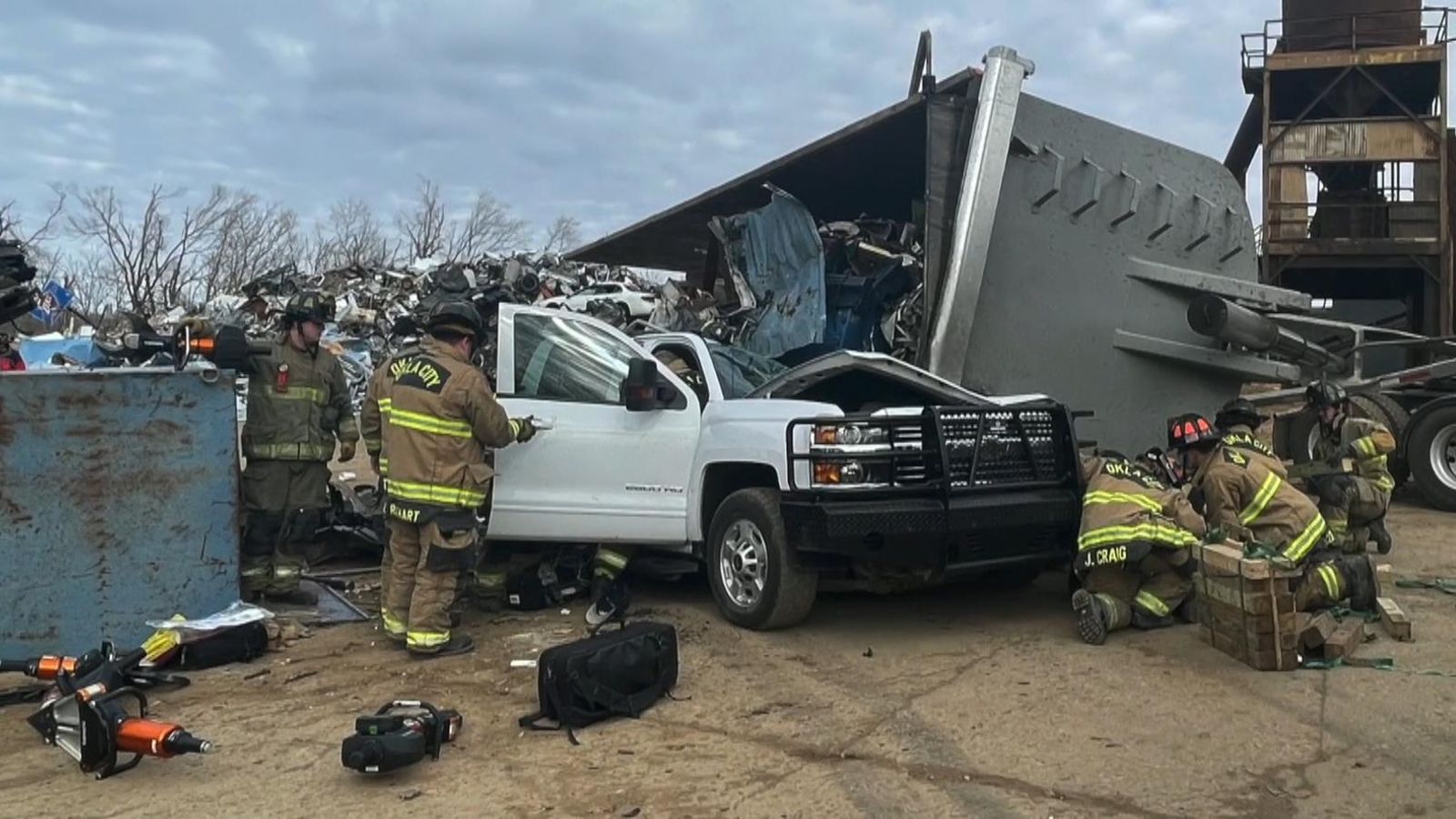 US driver crushed under scrap metal survives US News Sky News