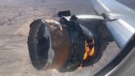 The engine of United Airlines Flight 328 is on fire after after experiencing "a right-engine failure" shortly after takeoff from Denver International Airport, Saturday, Feb. 20, 2021, in Denver, Colo. The Boeing 777 landed safely and none of the passengers or crew onboard were hurt. (Chad Schnell via AP)